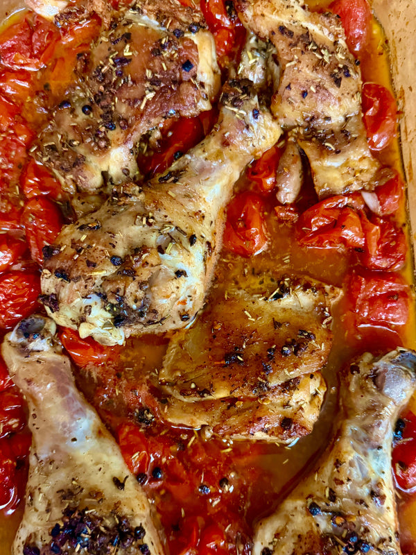 Garlic Chicken with blistered grape tomatoes seasoned with Uncle A’s Asian Spice.